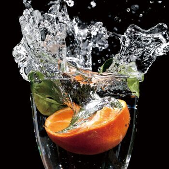 Glasbild „Splash Orange“ 60 x 60 cm